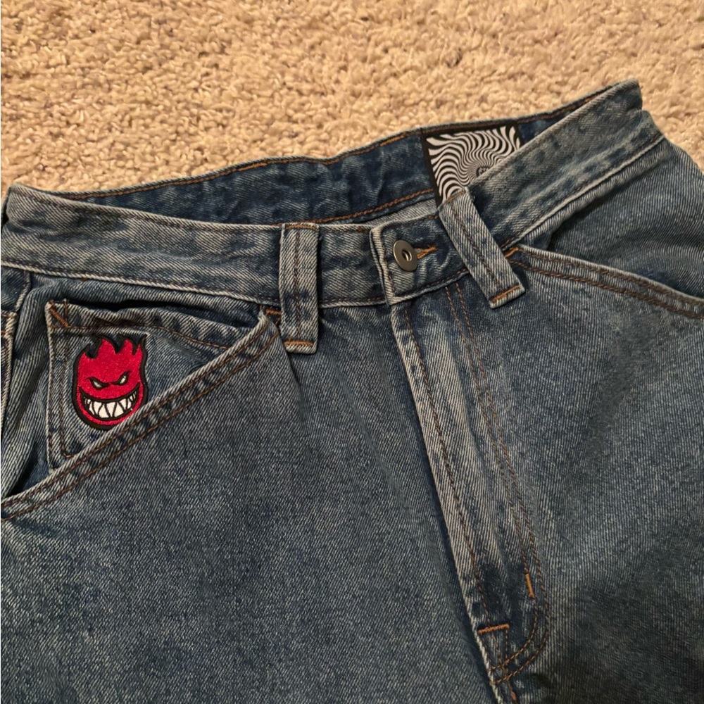 Men's Blue Jeans with Red Patch
